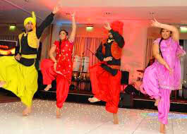 Giddha dancers celebrating at Punjab cultural festival
